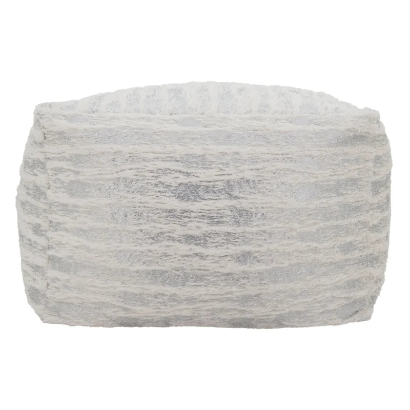 Pouf en fausse fourrure avec motif imprimé métallique